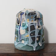 green and blue ceramic bottle by Dawn Hajittofi, UK ceramicist .