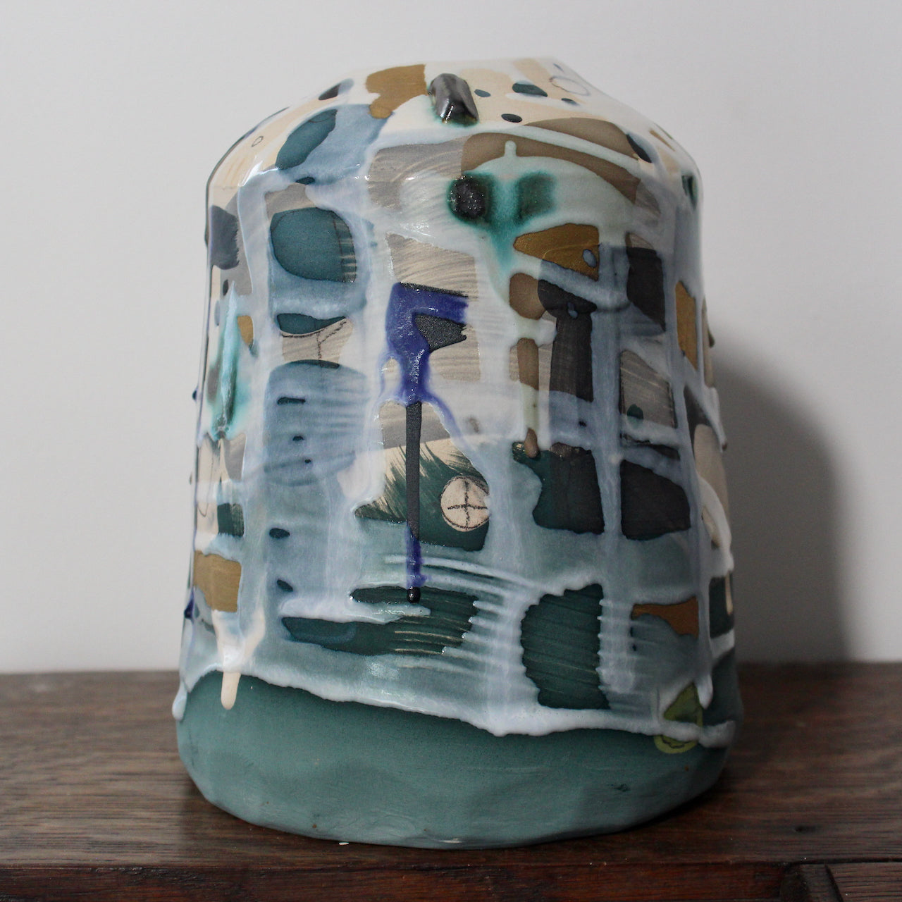 green and blue ceramic bottle by Dawn Hajittofi, ceramicist