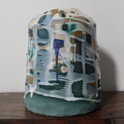 green and blue ceramic bottle by Dawn Hajittofi, ceramicist 
