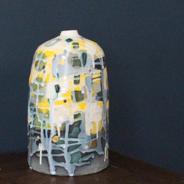 tall yellow and pale blue  ceramic bottle  by Uk ceramicist Dawn Hajittofi