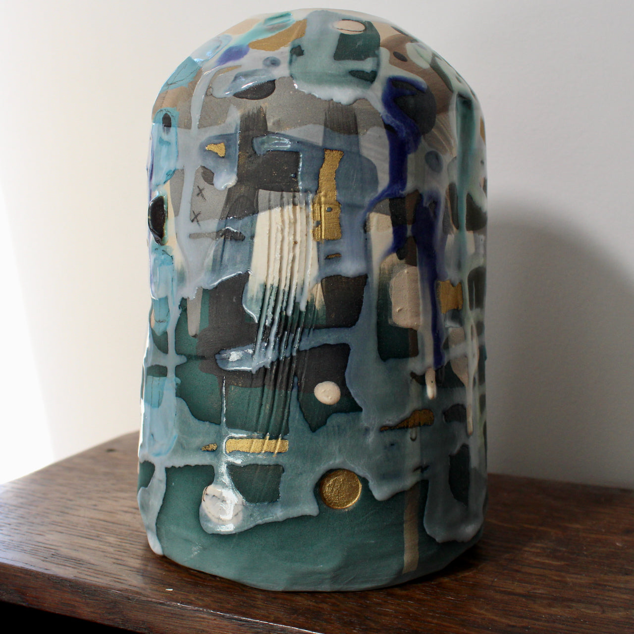 textured green and blue ceramic bottle by Dawn Hajittofi, ceramicist