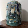 textured green and blue ceramic bottle by Dawn Hajittofi, ceramicist 