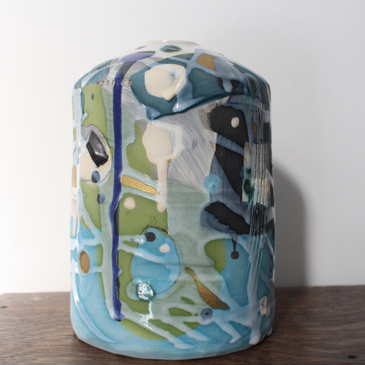 a textured pale blue and turquoise ceramic bottle by Dawn Hajittofi, UK ceramicist 