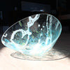irregular shaped glass vessel in clear, blue and white glass by Helen Eastham UK glass artist 