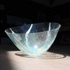 glass vessel by UK glass artist Helen Eastham in pale green glass with white and turquoise details 