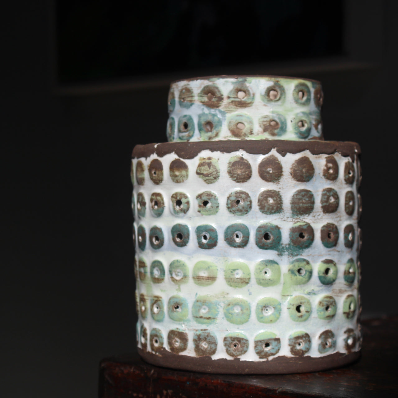textured ceramic vessel in brown, blues and green by UK ceramicist Elly Wall