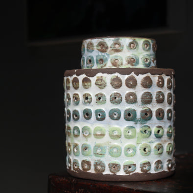  textured ceramic vessel in brown, blues and green by UK ceramicist Elly Wall