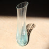 tall and narrow clear glass vessel with angled top and turquoise details by Helen Eastham glass artist 