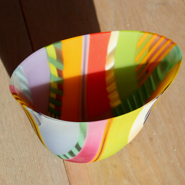 interior of an oval shaped glass bowl in green, pink, and pale blue stripes by UK glass artist Ruth Shelley