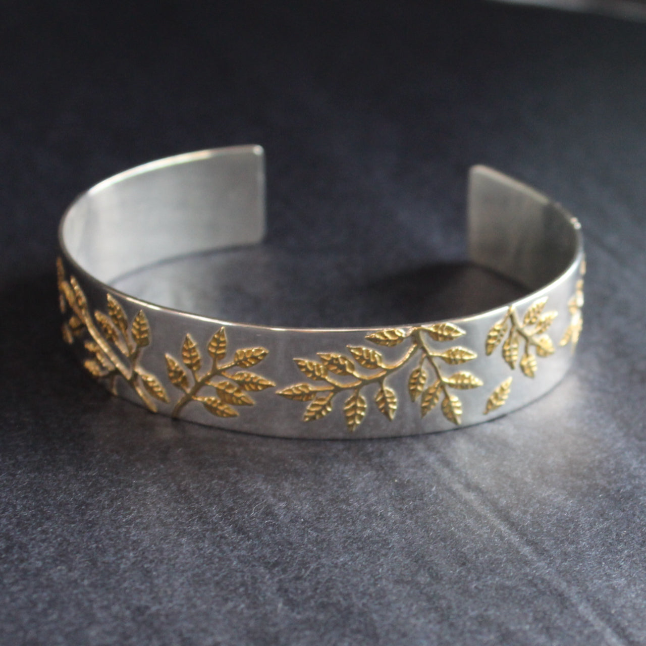 Plantae bangle in silver with gold leaf detail by Beverly Bartlett