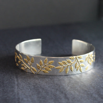 Plantae bangle in silver with gold leaf detail by Beverly Bartlett