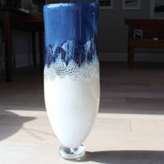 Tall blue and white glass vessel by glass artist Benjamin Lintell 