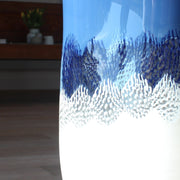 close up of a detail in a blue and white glass vessel by glass artist Benjamin Lintell 