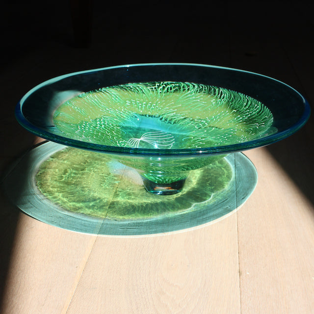 blue and green glass bowl by Benjamin Lintell  photographed in sunlight.