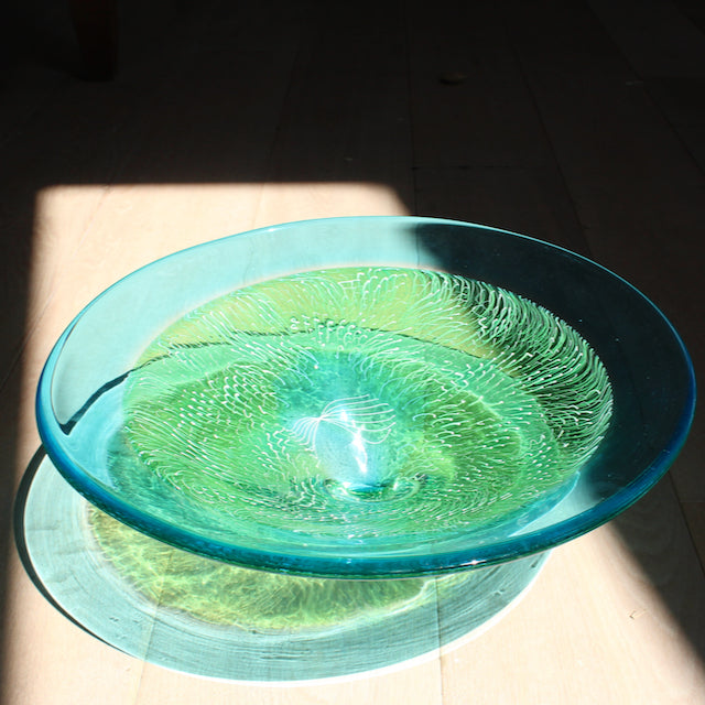 Benjamin Lintell blue and green glass bowl photographed in sunlight