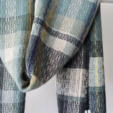 textile designer Teresa Dunne's handwoven scarf in blues, greens and greys