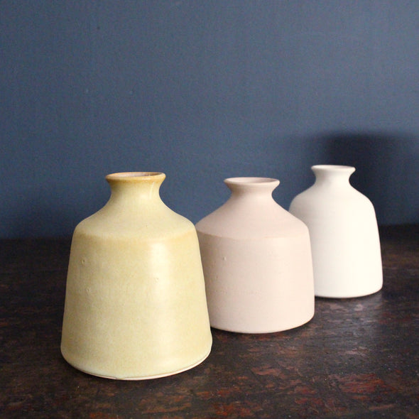 a trio of bud vases by UK ceramicist Emily Olivia Tapp.