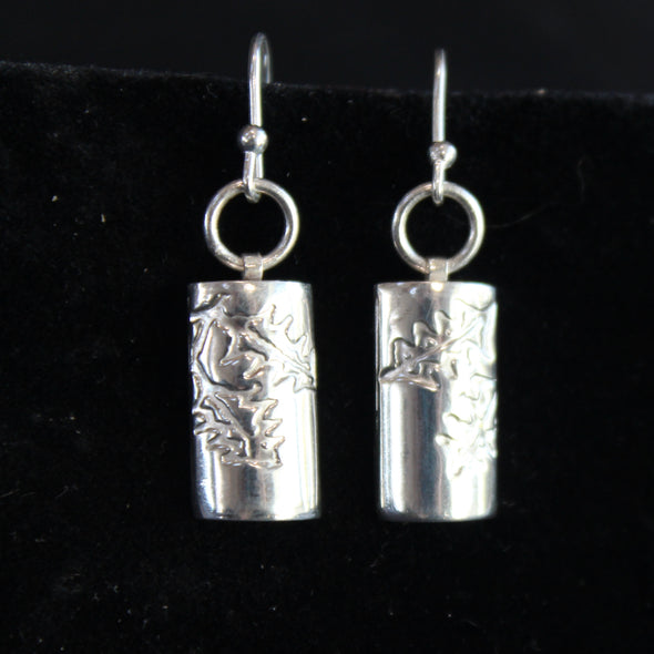 Plantae earrings with embossed holly in silver by Beverly Bartlett