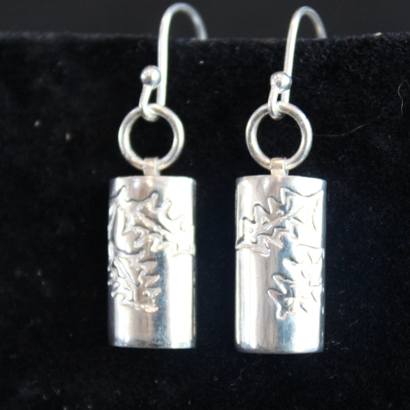 Plantae earrings with embossed holly in silver by Beverly Bartlett