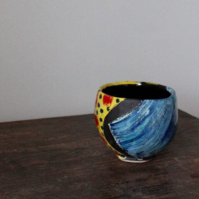 brightly coloured small ceramic bowl by UK potter John Pollex