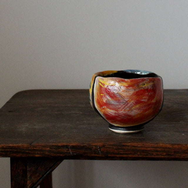 ceramic teabowl in red and yellow by leading UK potter John Pollex 