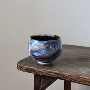 ceramic tea bowl in blues, pinks and reds by UK potter John Pollex 