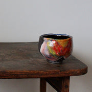 ceramic tea bowl in blues, pinks and reds by UK ceramicist John Pollex 