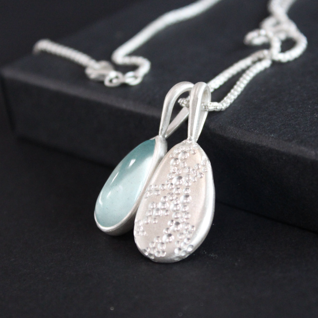 Carin Lindberg - Moss aquamarine and textured silver pebble pendants Media close up