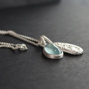 Carin Lindberg - Moss aquamarine and textured silver pebble pendants 