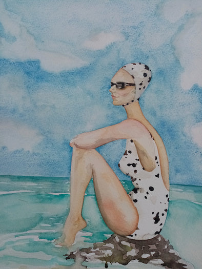 print of a painting by Cornwall artist Fiona Chives of female swimmer sitting on a rock wearing a black and white spotty swimsuit, matching cap and sunglasses