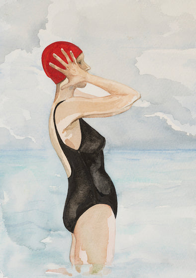 print of a watercolour painting by Cornwall artist Fiona Chivers of a female swimmer in a black swimsuit and red cap standing in the sea