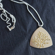 Plantae flat pendant in silver with gold tree detail by Beverly Bartlett