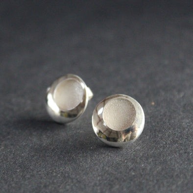 silver earrings with a textured centre by beverly bartlett, jewellery designer 