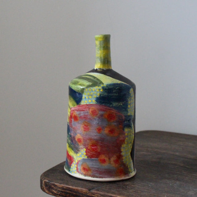 brightly coloured ceramic bottle by UK potter John Pollex.