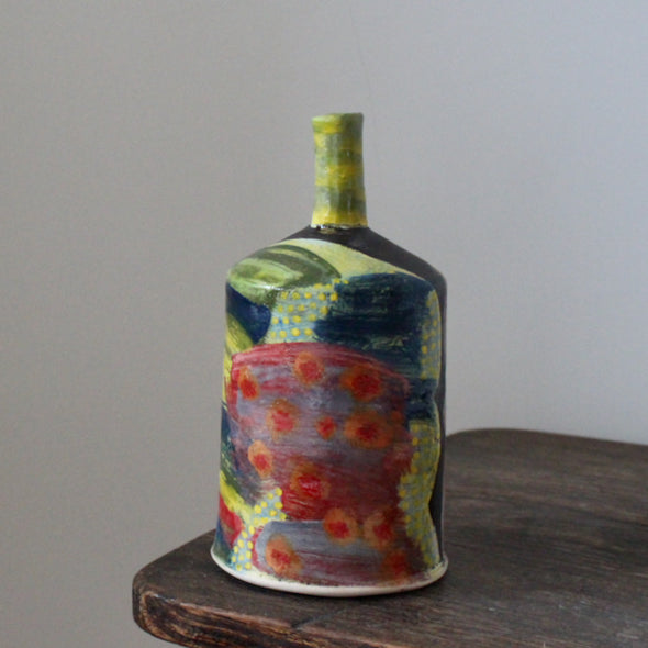 brightly coloured ceramic bottle by UK potter John Pollex.
