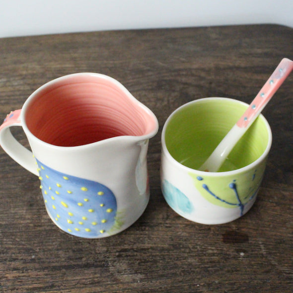 colourful ceramic cream jug and bowl with spoon by  Helen Harrison.