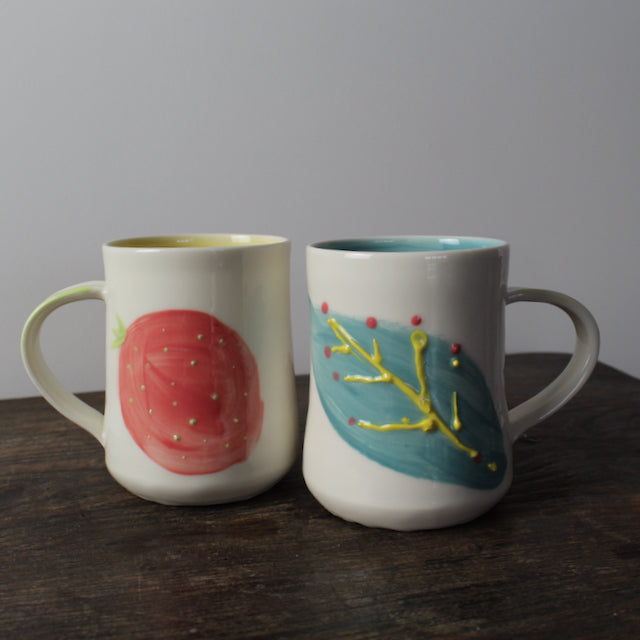 porcelain decorated mugs by Helen Harrison.