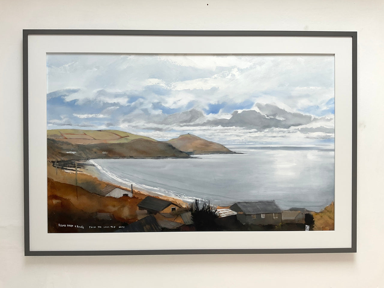 a framed painting of Rame Head and coastline in south east Cornwall by Cornish artist Steven Buckler.