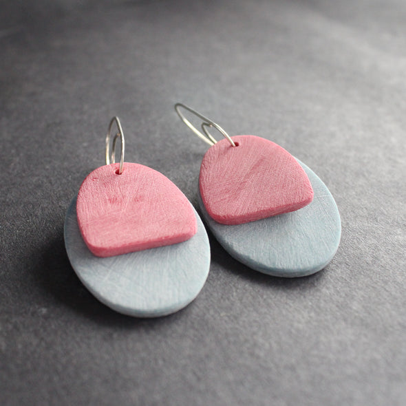 oval shaped earrings in pale blue and pink by jewellery designer Clare Lloyd 