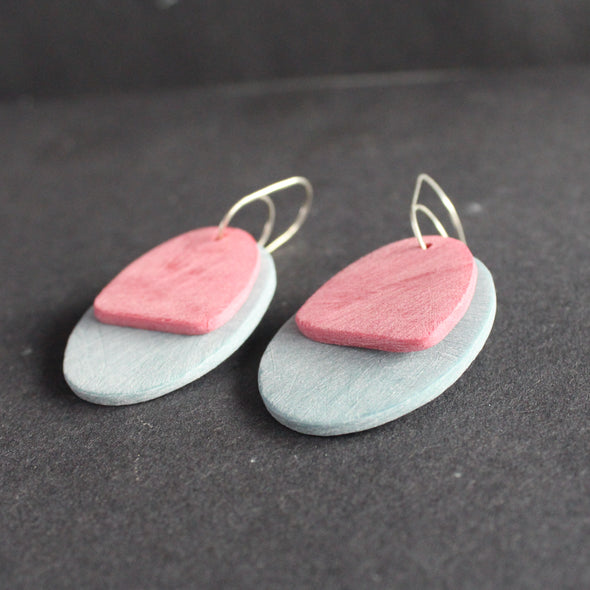 oval shaped earrings in pale blue and pink by UK jewellery designer Clare Lloyd. 