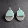 oval shaped earrings in grey and green by jewellery designer Clare Lloyd 