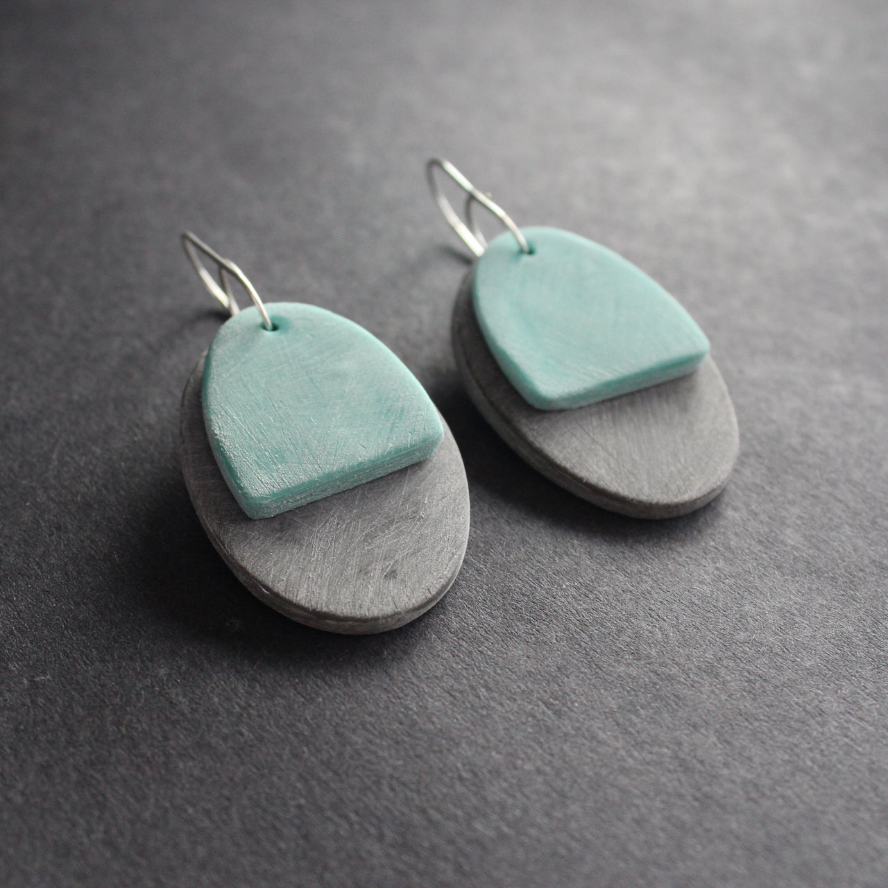 oval shaped earrings in grey and green by UK jewellery designer Clare Lloyd