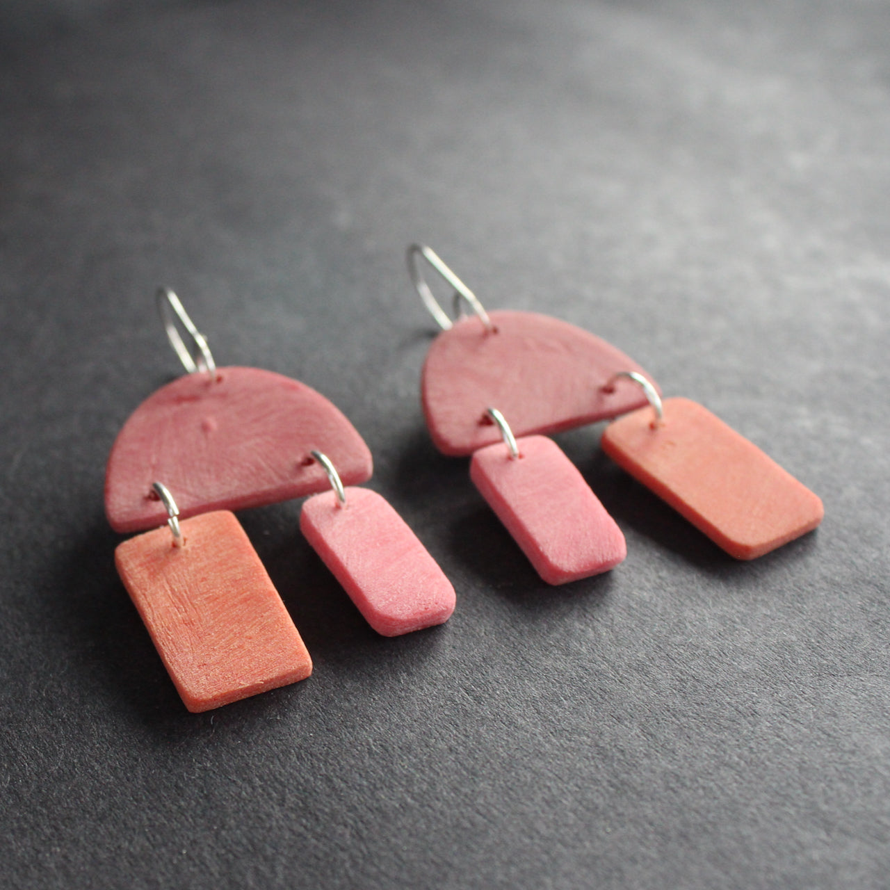 red and pink earrings by jewellery designer Clare Lloyd