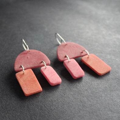 red and pink earrings by jewellery designer Clare Lloyd 