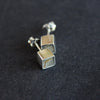 Amy Stringer cube stud earrings made in cement and silver