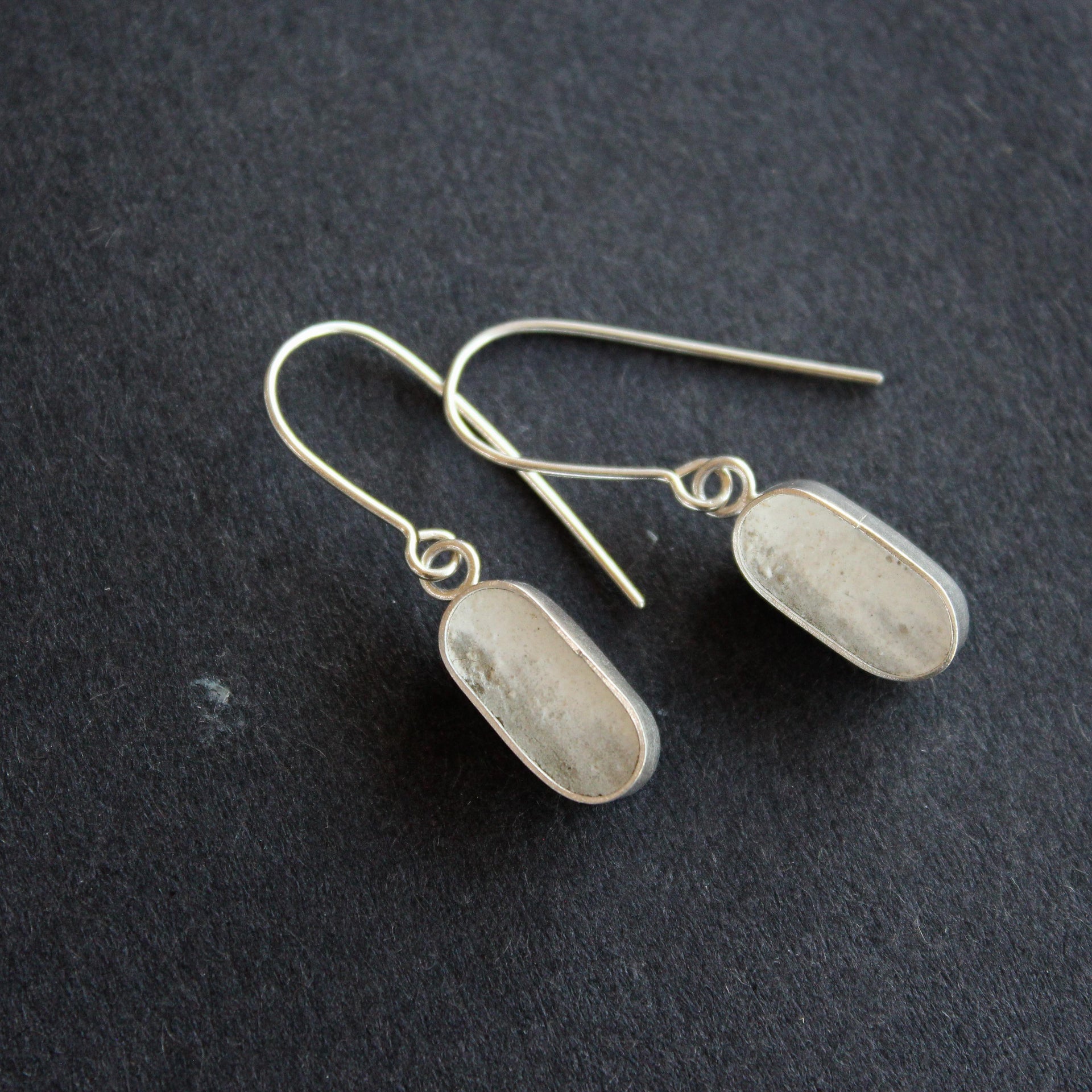 Lozenge drop earrings in silver and cement by Amy Stringer