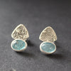 textured silver earrings with blue stone by jeweller Carin Lindberg 