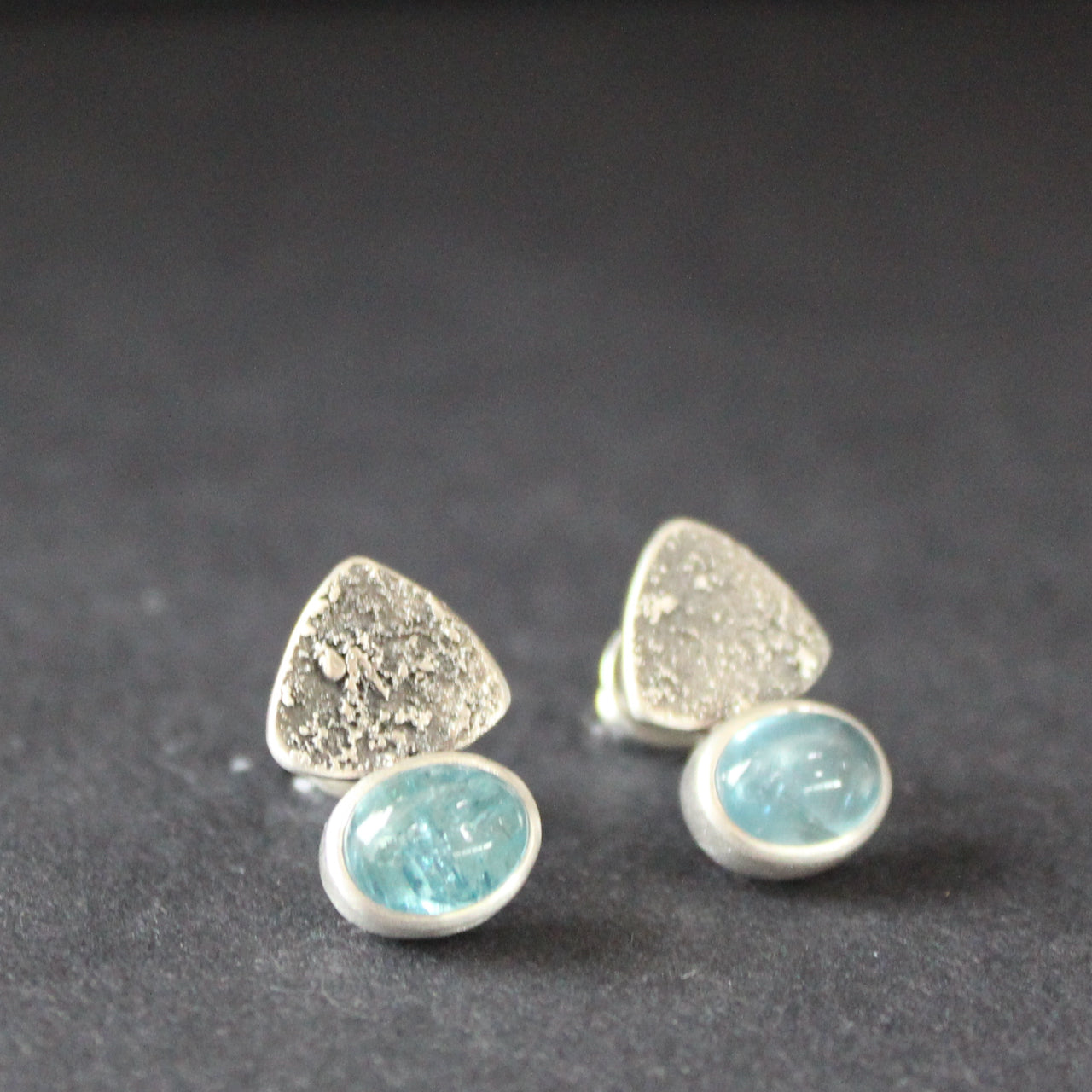 pair of textured silver earrings with blue stone by Cornwall based jeweller Carin Lindberg