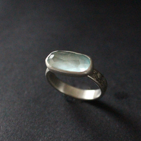 textured silver ring with blue stone by jeweller Carin Lindberg 