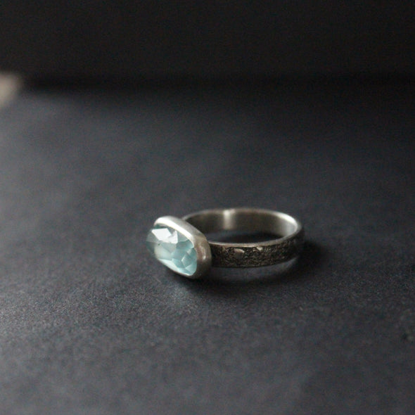 a textured silver ring with blue stone by Cornwall based  jeweller Carin Lindberg.